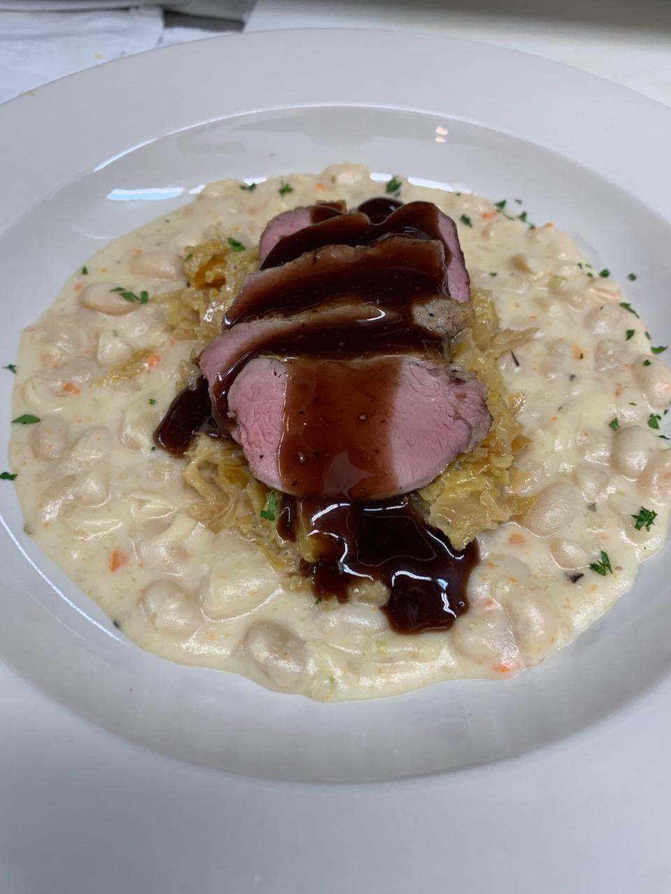Duck with white bean risotto